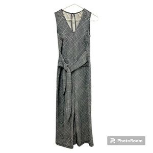 Wrapper wide leg jumpsuit with a V-neckline and belt